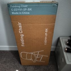 2 Metal Folding Chairs With Pads 