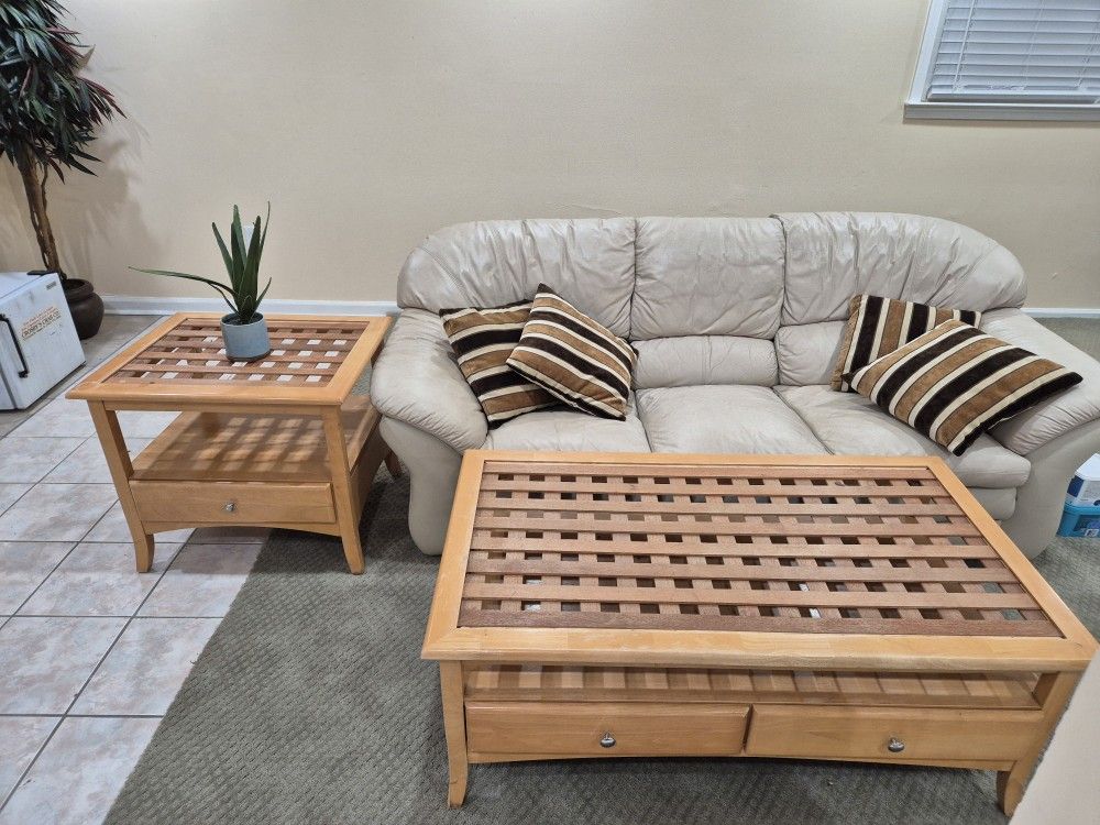 Large wooden coffee table with matching side tables