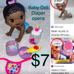 $7 Baby alive with Accessories,baby eats and back diaper open to take out