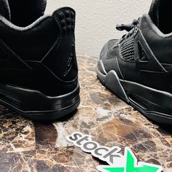 Black Cat Jordan 4s 