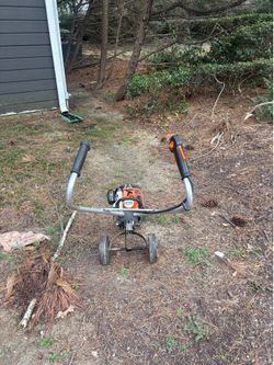 STIHL MM 55 Yard Boss cultivator/tiller, a versatile yard tool with a 2-cycle engine