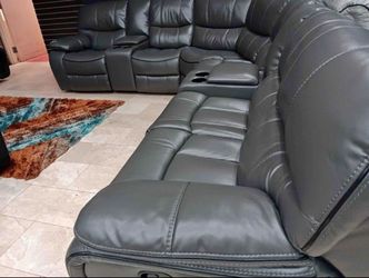 Limited time sale. Madrid gray leather reclining sectional only $1399. Easy finance option. Same-day delivery.