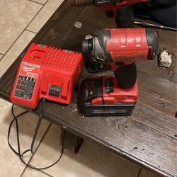 Milwaukee Drill Batt  And Charger 