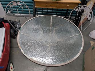 Wrought iron table with 2 chairs  wrought iron decorative wall art.