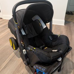 Doona Infant Car Seat & Stroller w/ Base – 2023 Model