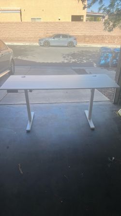 Height adjustable desk.