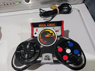 Jackson Pacific / Midway " Mortal Kombat" plug in play TV game system.  Good condition.  