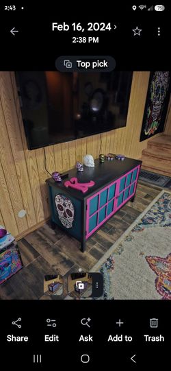 Entertainment stand. Custom painted with skulls on each side