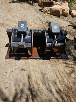 Caterpillar grapple bucket