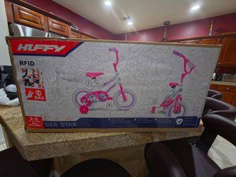 Girls bike with training wheels