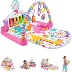 Fisher-Price Deluxe Kick & Play Piano Gym mat featuring a pink elephant and a monkey design