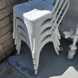 Set Of 4 Stackable White Metal Chairs
