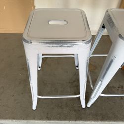 Set of 2 white distressed metal stools