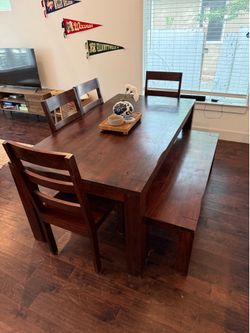 Solid wood dining table with chairs and bench