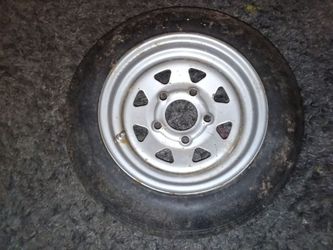 TRAILER TIRE 4.80-12 trailer tire mounted on a 5-lug galvanized spoke wheel