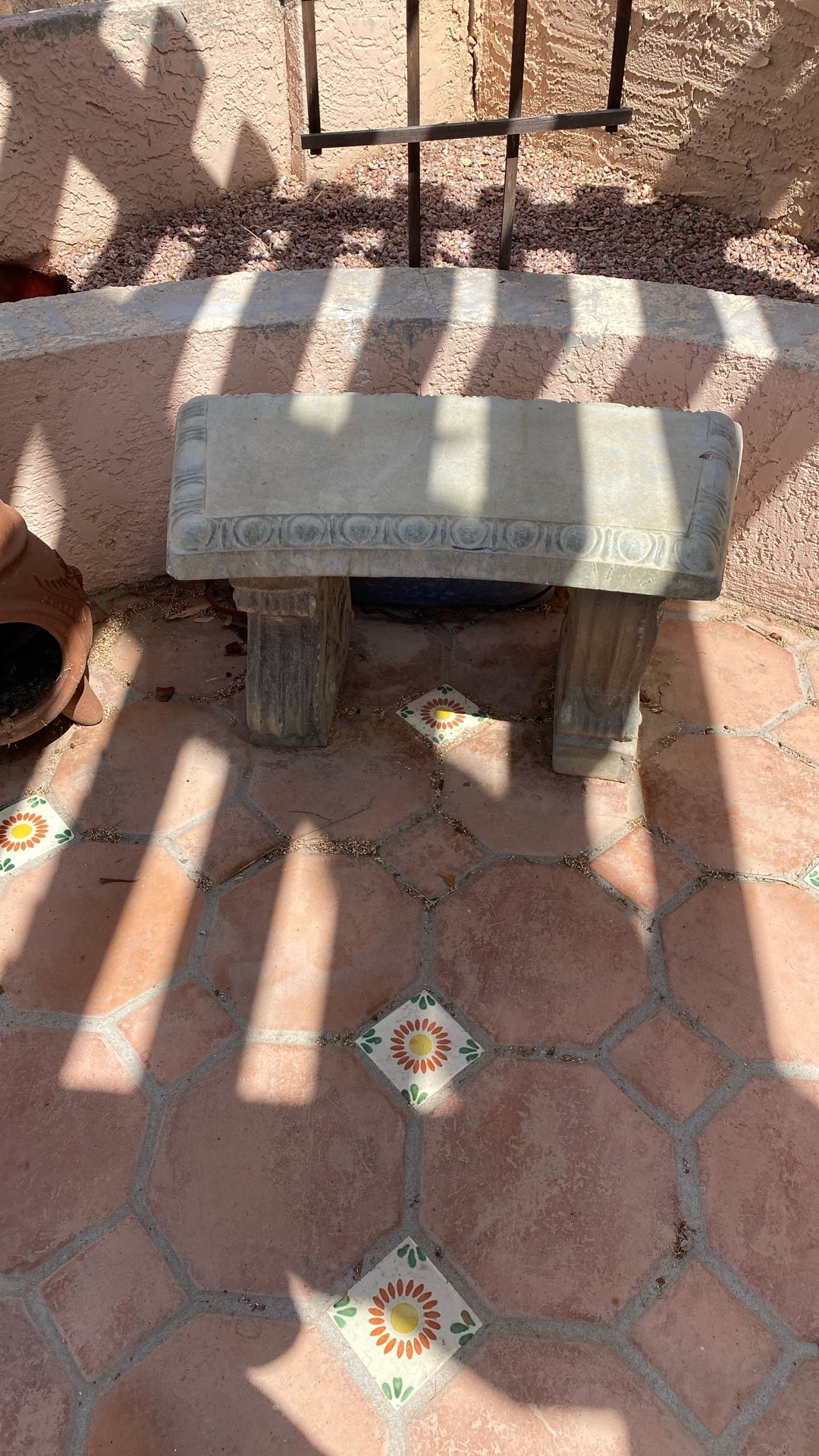 Outdoor bench, herb planter, as well as extremely large pot