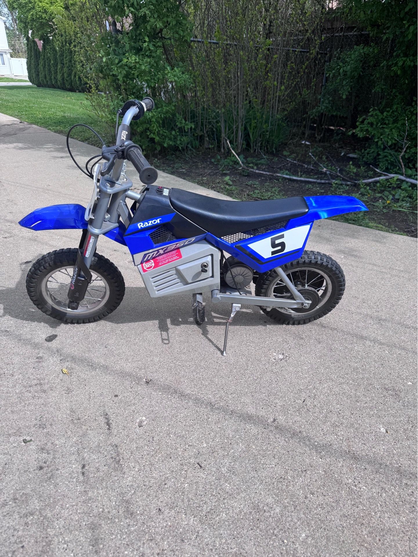 Blue electric dirt bike for kids