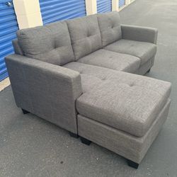 Gray Tufted Reversible Sectional Sofa