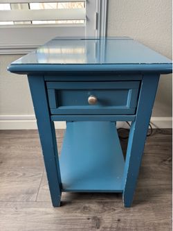 Side table with outlets