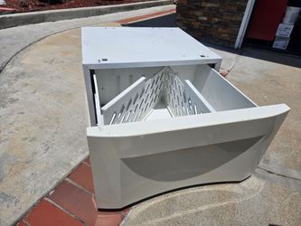 Storage bin for washing  or dryer machine