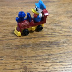 Vintage Walt Disney Productions Toy Train Locomotive With Donald Duck .  Size 2 1/4 inches Long and 1 inches wide.  Brand New Never Used.  