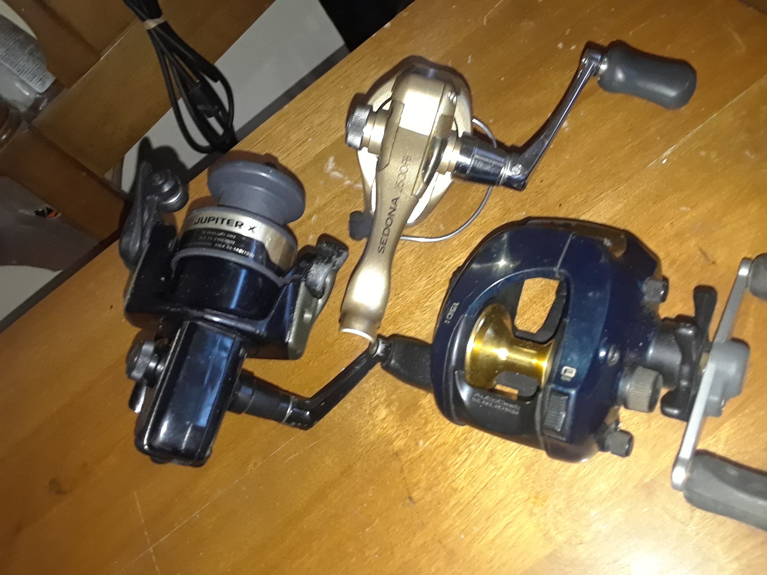 3 Fishing Reel Lot Shimano Sedona 2500FB, Daiwa Jupiter-X 2505T, Realmaster 150i (All 3 For $50)