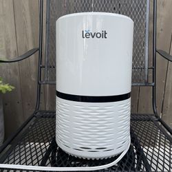 Levoit Air Purifier.. needs new filter. measures 12h x8d inches 