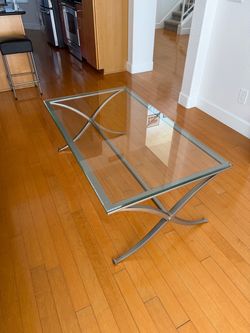 Glass and brushed nickel coffee table