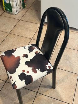 Cow print dining chair