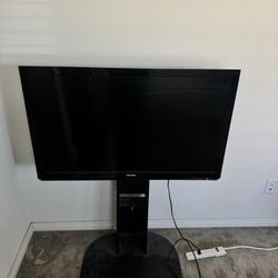40’ Toshiba TV with stand 