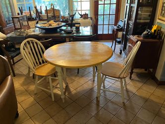 Solid wood table with two chairs for small space