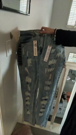 Reason brand new jeans tags on them