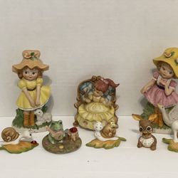 Cute collection of porcelain figurines including a young princess.  