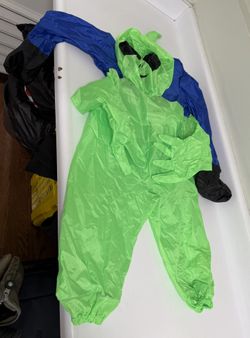 Green and blue inflatable alien costume, with operating and inflating instructions.