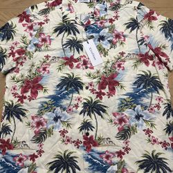 Caribbean Joe Hawaiian shirt with a tropical hibiscus and palm tree print.