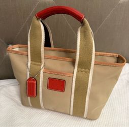 Coach light brown mini purse