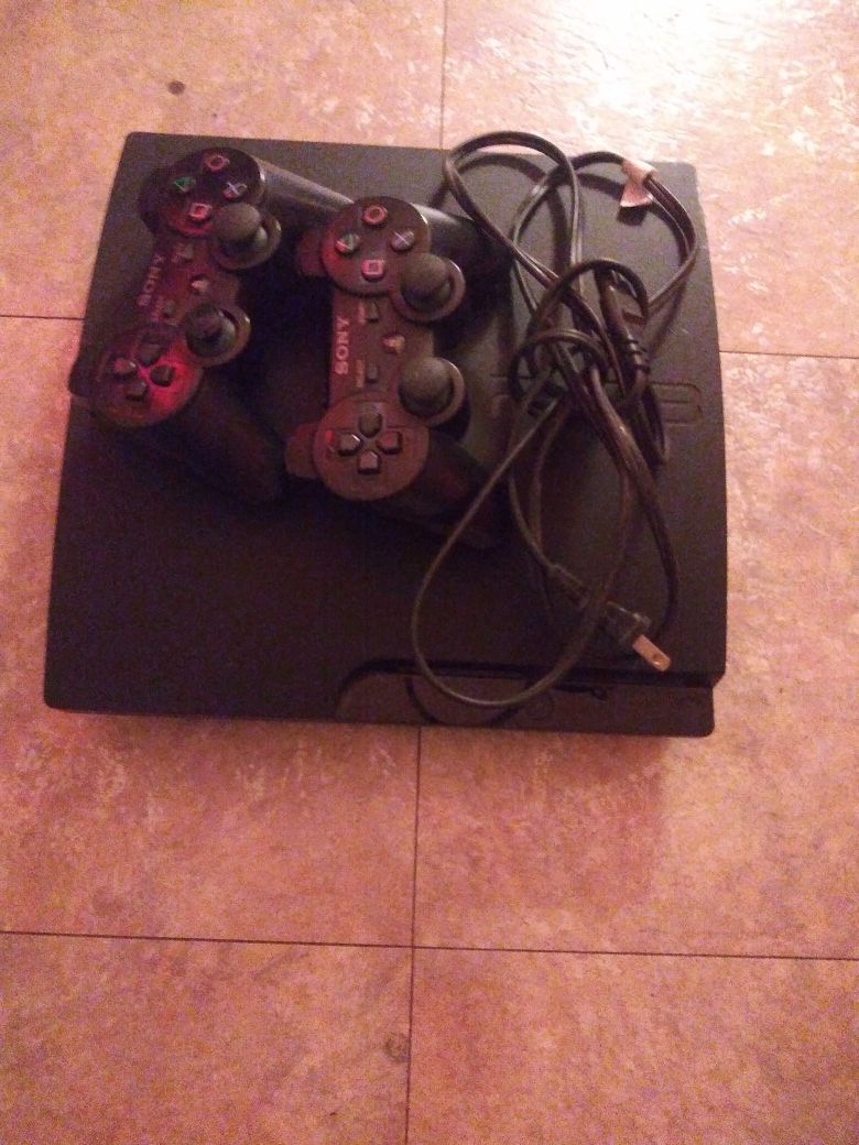 Ps3 with 2 wireless controllers and games