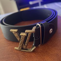 Black  belt with silver buckle. measure 36.