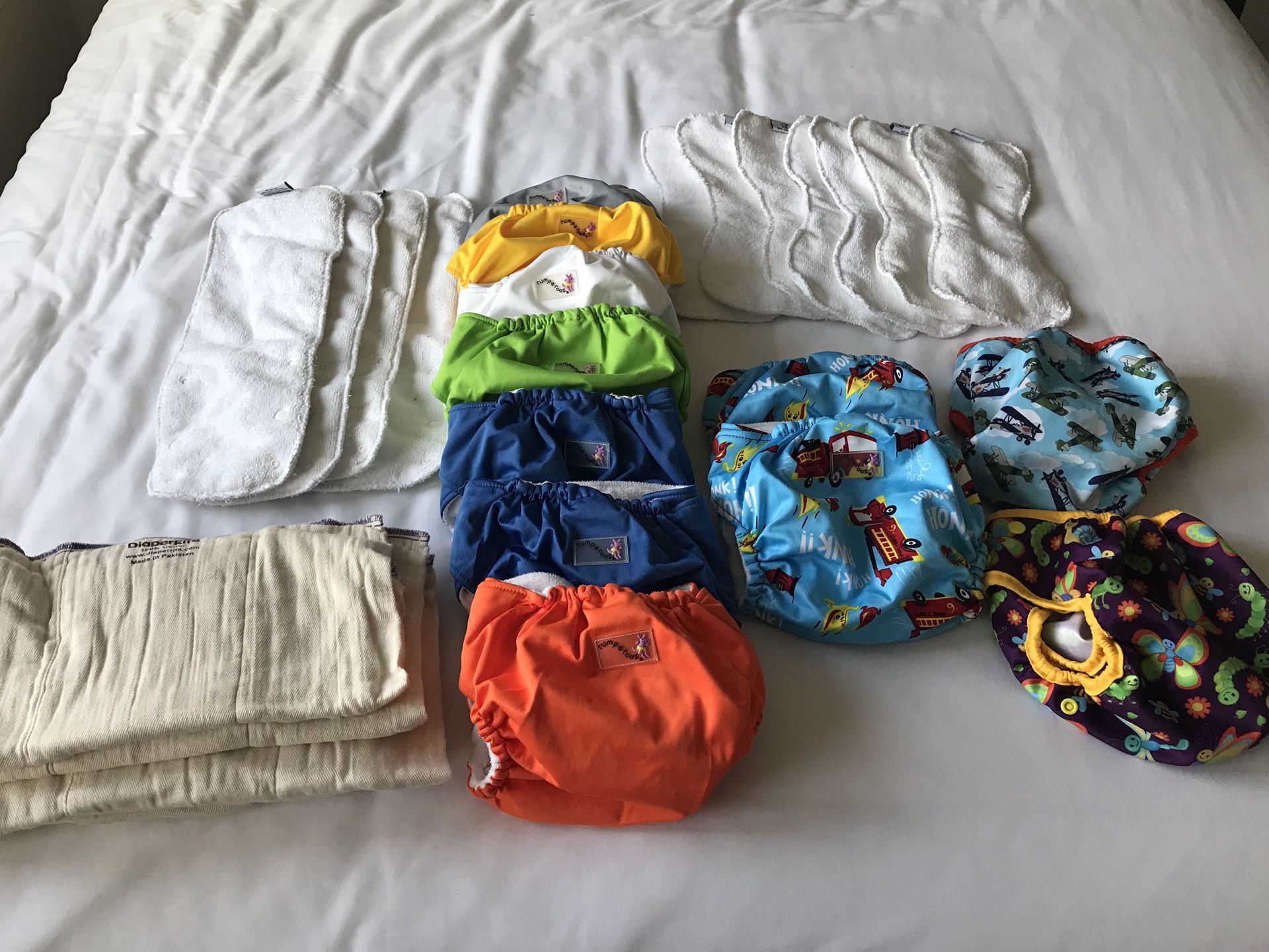 11 cloth diapers and inserts