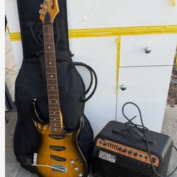Guitarra Eléctrica Con Su Amplificador  En Perfectas Condiciones 