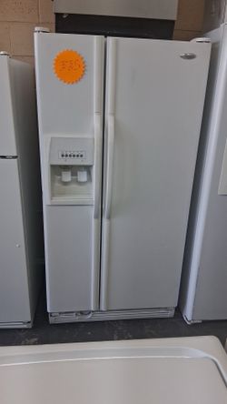 Nice Whirlpool side by side refrigerator