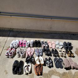 Total Of 24 Pairs Of Shoes. Women's 23 Pairs Size 6-8 Men's 1 Pair Size 11