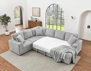 122” modular sleeper sofa with chaise, storage, pull-out bed, and charging ports