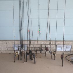 Assorted Fishing Poles And Meat Grinder 