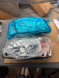 04-06 Toyota Highlander Headlights Chrome Housing Driver Passenger LH RH