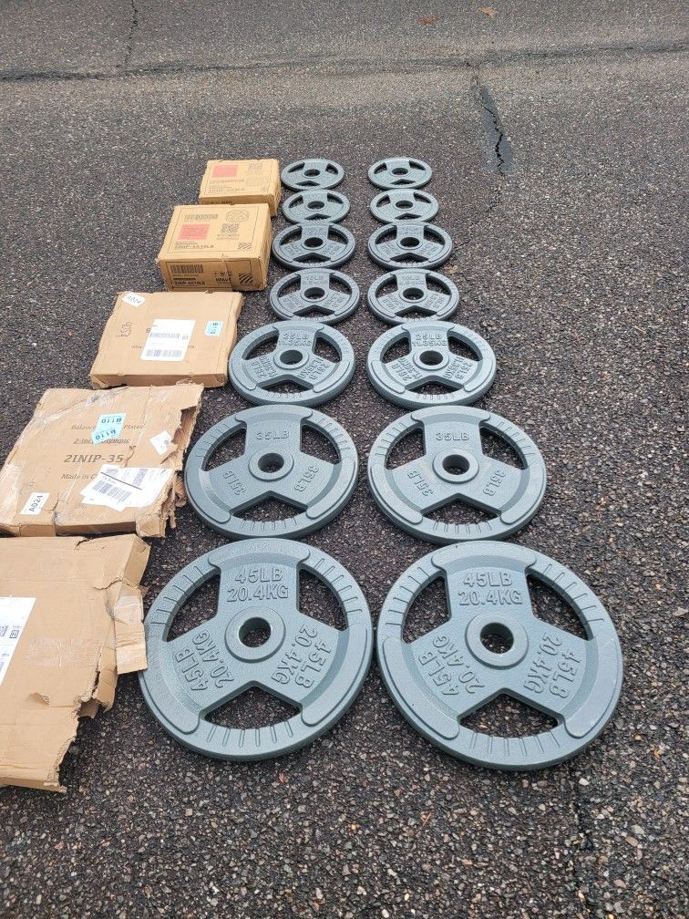 NEW IN BOX Olympic Grip Plates-270lbs