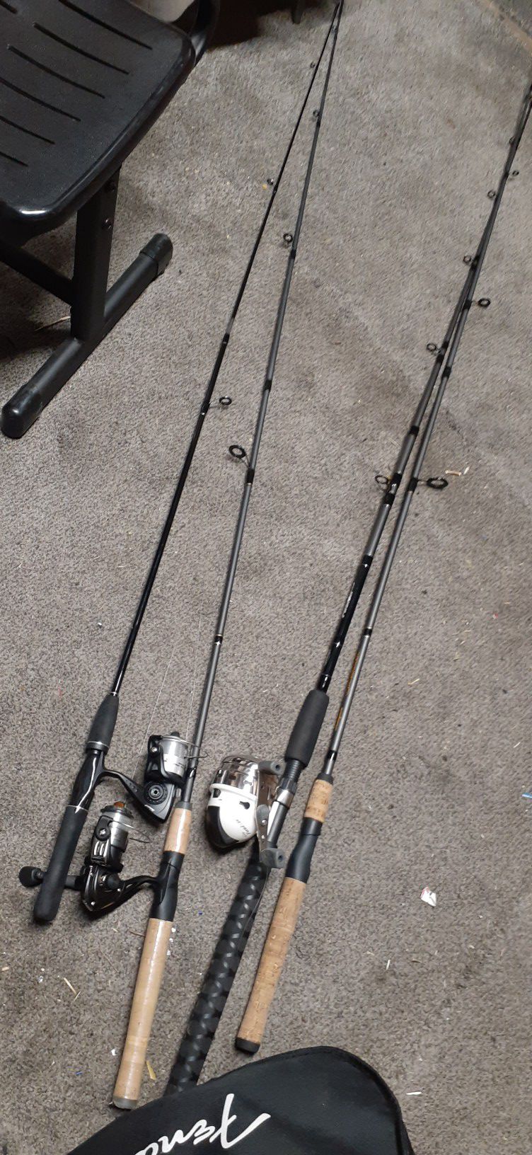 4 fishing rods 3 reels and some tackle