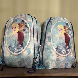 Two Frozen Anna, Elsa, Olaf sleeping bags with backpack carrying case. 
