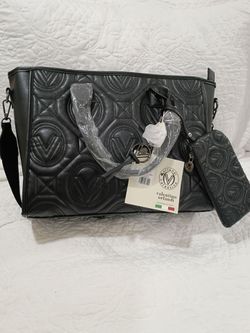 Cartera con agarradera