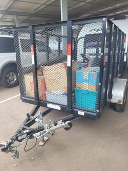 Utility Trailer w/ Mesh Walls and Loading Ramp